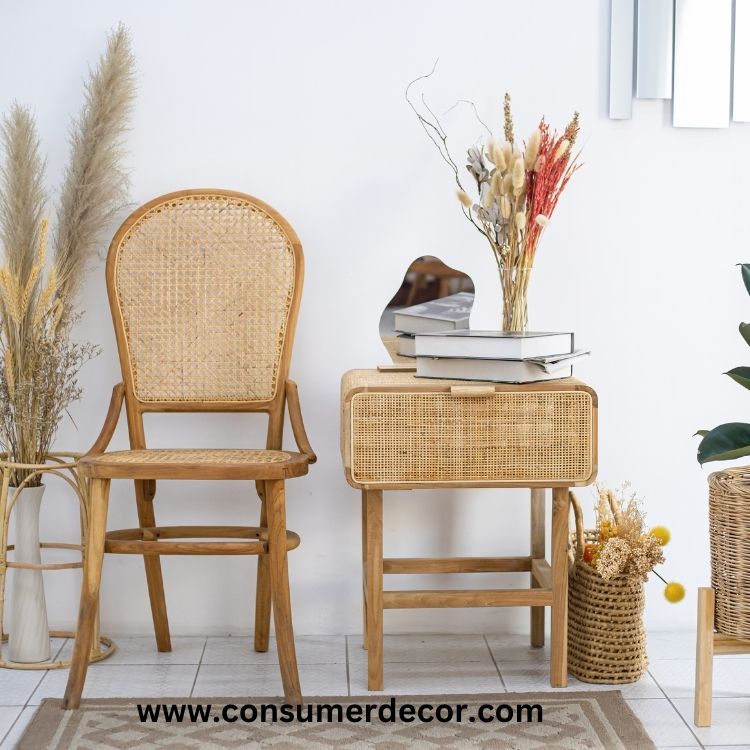 A cozy wicker chair and table surrounded by lush plants and elegant vases, enhancing the tranquil atmosphere.